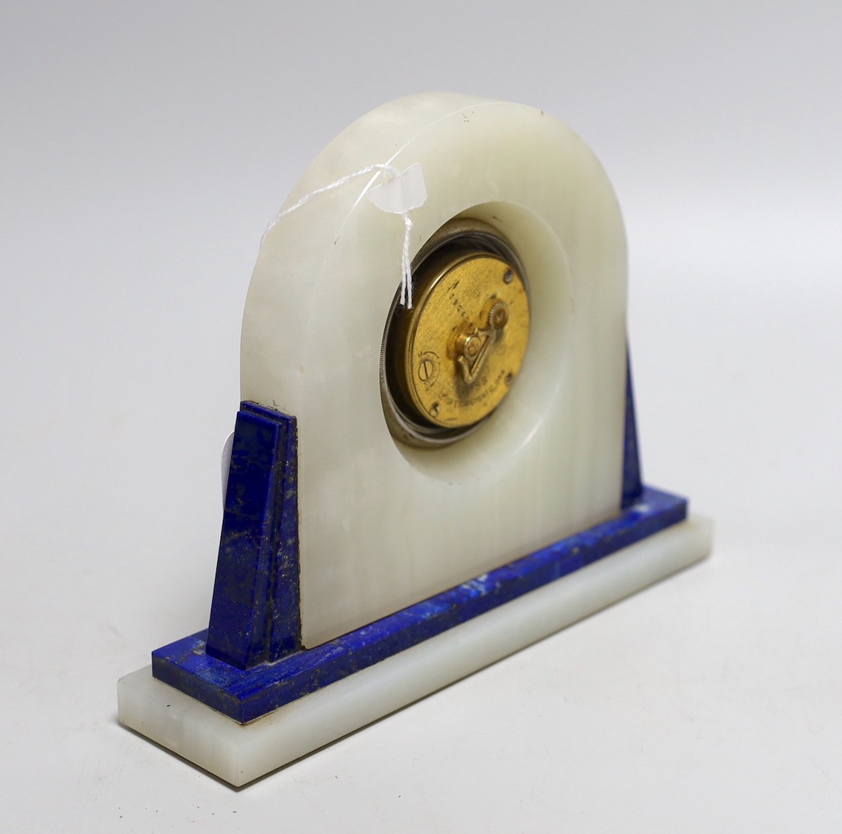 An Art Deco onyx and lapis lazuli cased lever escapement mantel clock, 15cms high